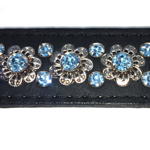 Black signature leather collar featuring intricate filigree design with blue crystals from Style Hound-detail view
